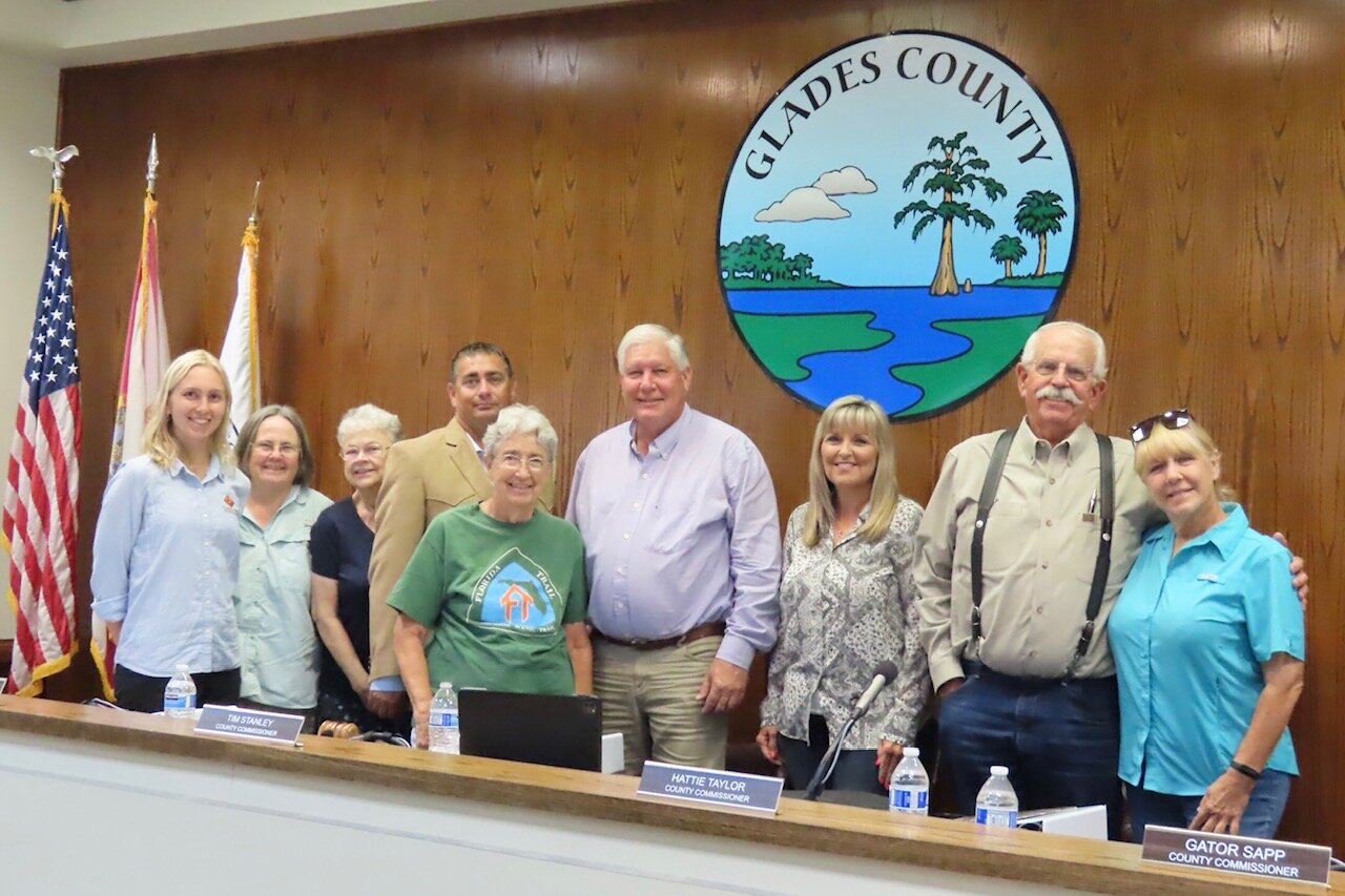Glades County Commissioners and FTA Members at the Glades BOCC Meeting on June 26, 2023. From left to right are: FTA Gateway Community Program Statewide Coordinator, Hailey Dansby; FTA Glades/Hendry Chapter Chair, Margaret England; Glades County Commissioner, Donna Storter-Long; Glades County Commissioner, Tony Whidden; FTA Glades/Hendry Chapter member, Betty Loomis; Glades Board of County Commissioners Chair, Tim Stanley; Glades County Commissioner, Hattie Taylor; Glades County Commissioner, Jerry “Gator” Sapp; FTA Glades/Hendry Chapter member, Darlene Evans
